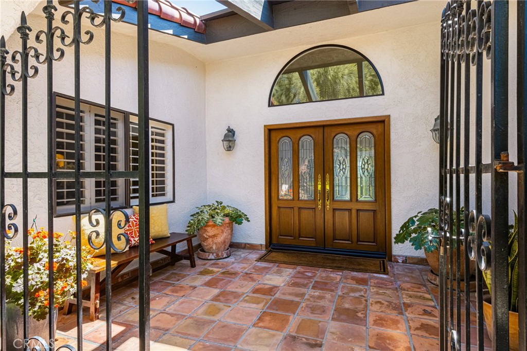9741 Rangeview Drive North Tustin, CA 92705 - Photo 6 of 48 Classic hacienda style front courtyard