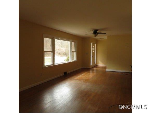 2005 Ratcliff Cove Road Waynesville, NC 28786 - Photo 11 of 20 a view of an empty room with a window
