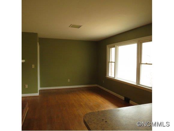 2005 Ratcliff Cove Road Waynesville, NC 28786 - Photo 4 of 20 a view of an empty room with a window