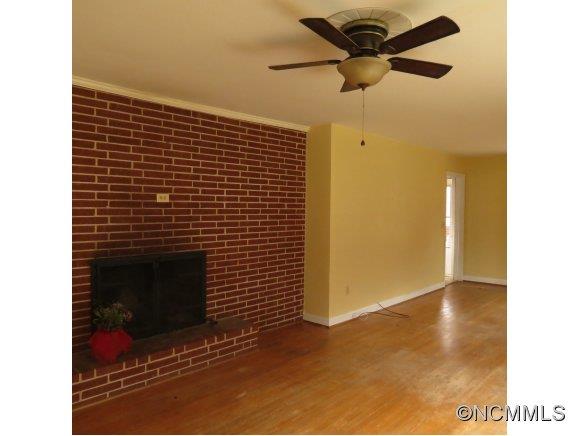 2005 Ratcliff Cove Road Waynesville, NC 28786 - Photo 6 of 20 a view of a livingroom with a fireplace