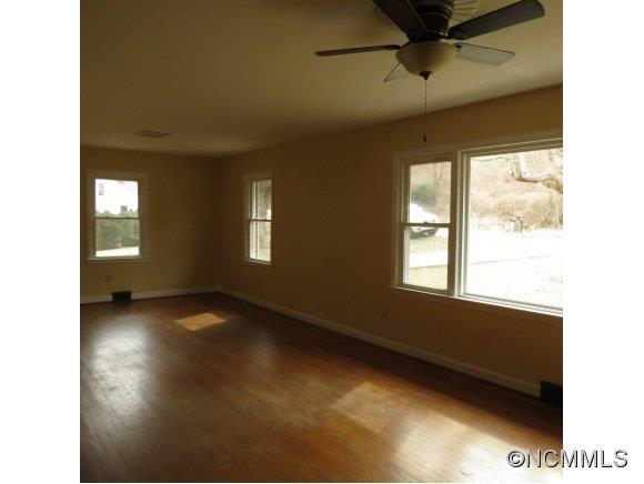 2005 Ratcliff Cove Road Waynesville, NC 28786 - Photo 7 of 20 a view of an empty room with a window