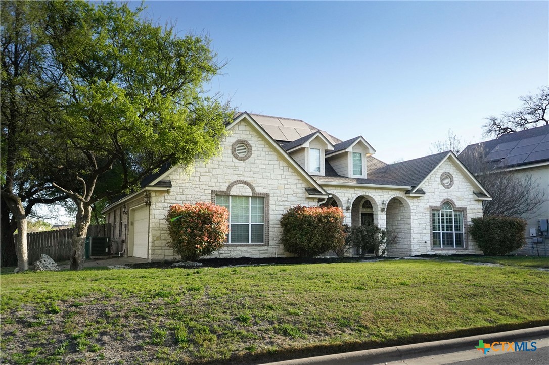 501 Marshall Drive Belton, TX 76513 - Photo 1 of 1 a front view of a house with garden