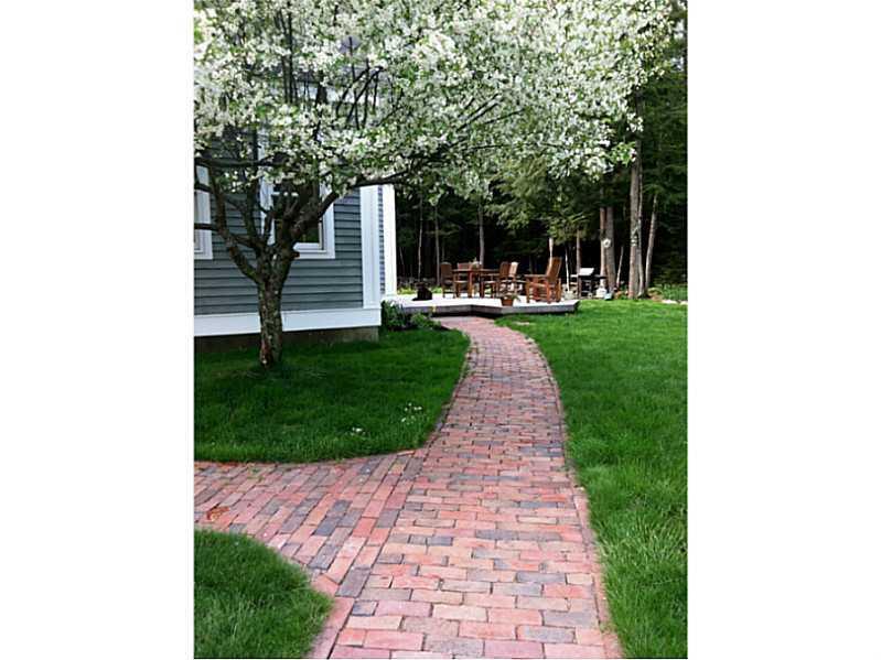 119 Merrill Road Gray, ME 04039 - Photo 5 of 33 Exterior Front. Brick walkway leads...