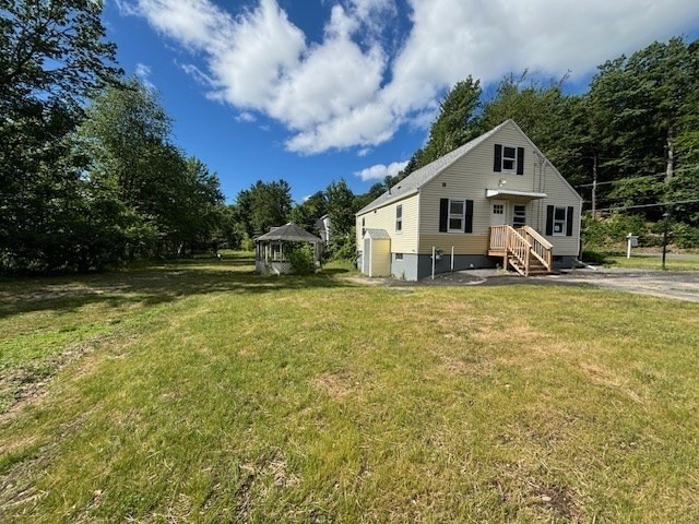 910 Fitchburg State Road Ashby, MA 01431 - Photo 3 of 18 a house view with a outdoor space