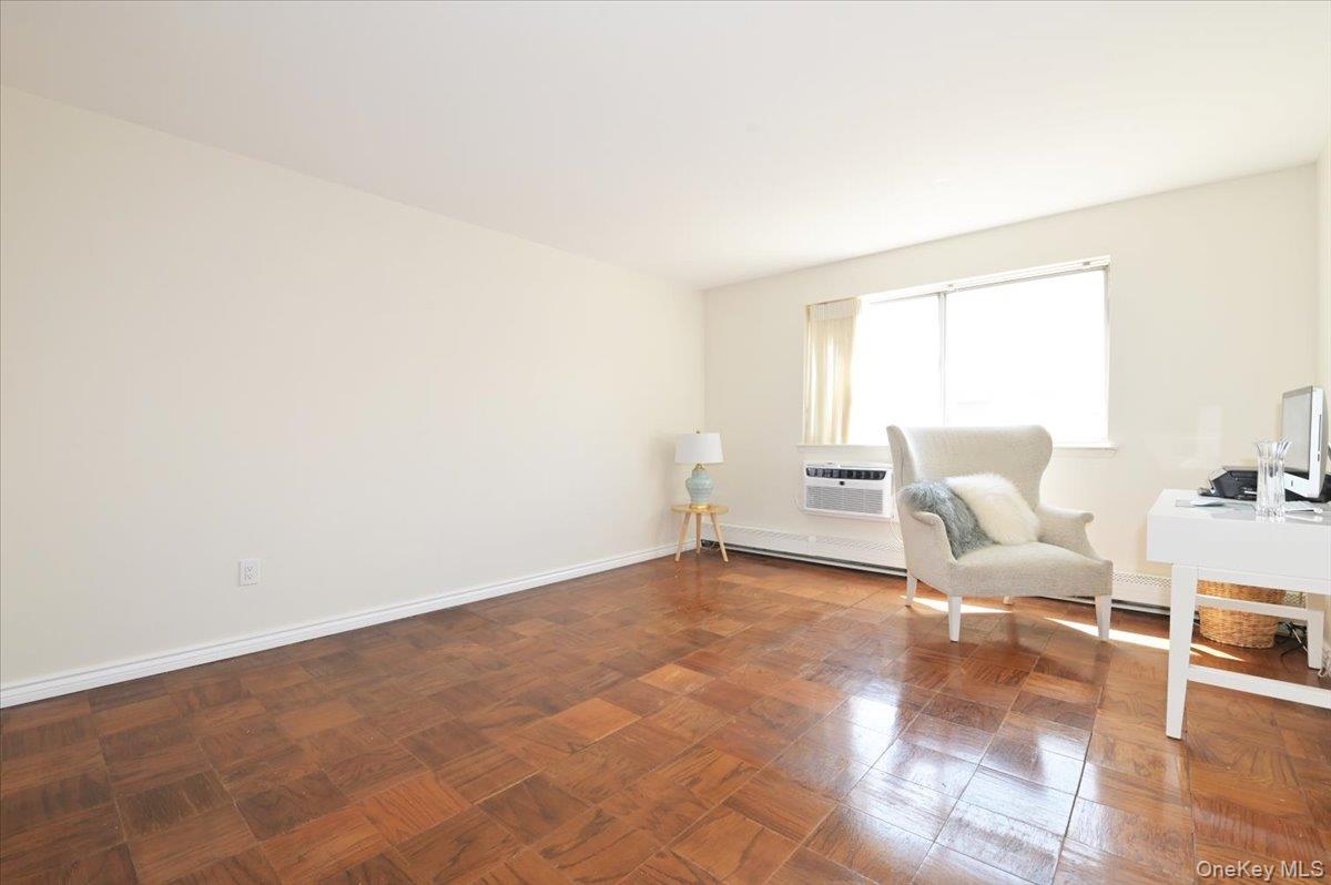 320 East Shore Road, Unit 4C Great Neck, NY 11023 - Photo 23 of 29 Office featuring parquet flooring and a baseboard radiator