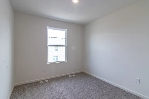 an empty room with a window