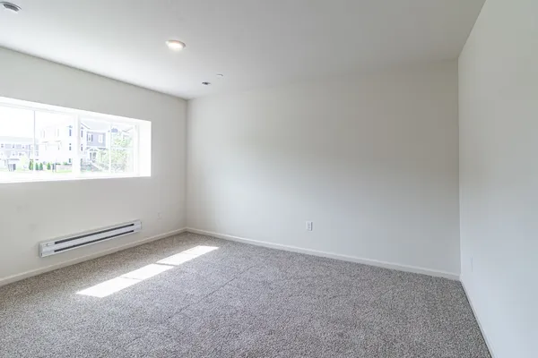 an empty room with windows