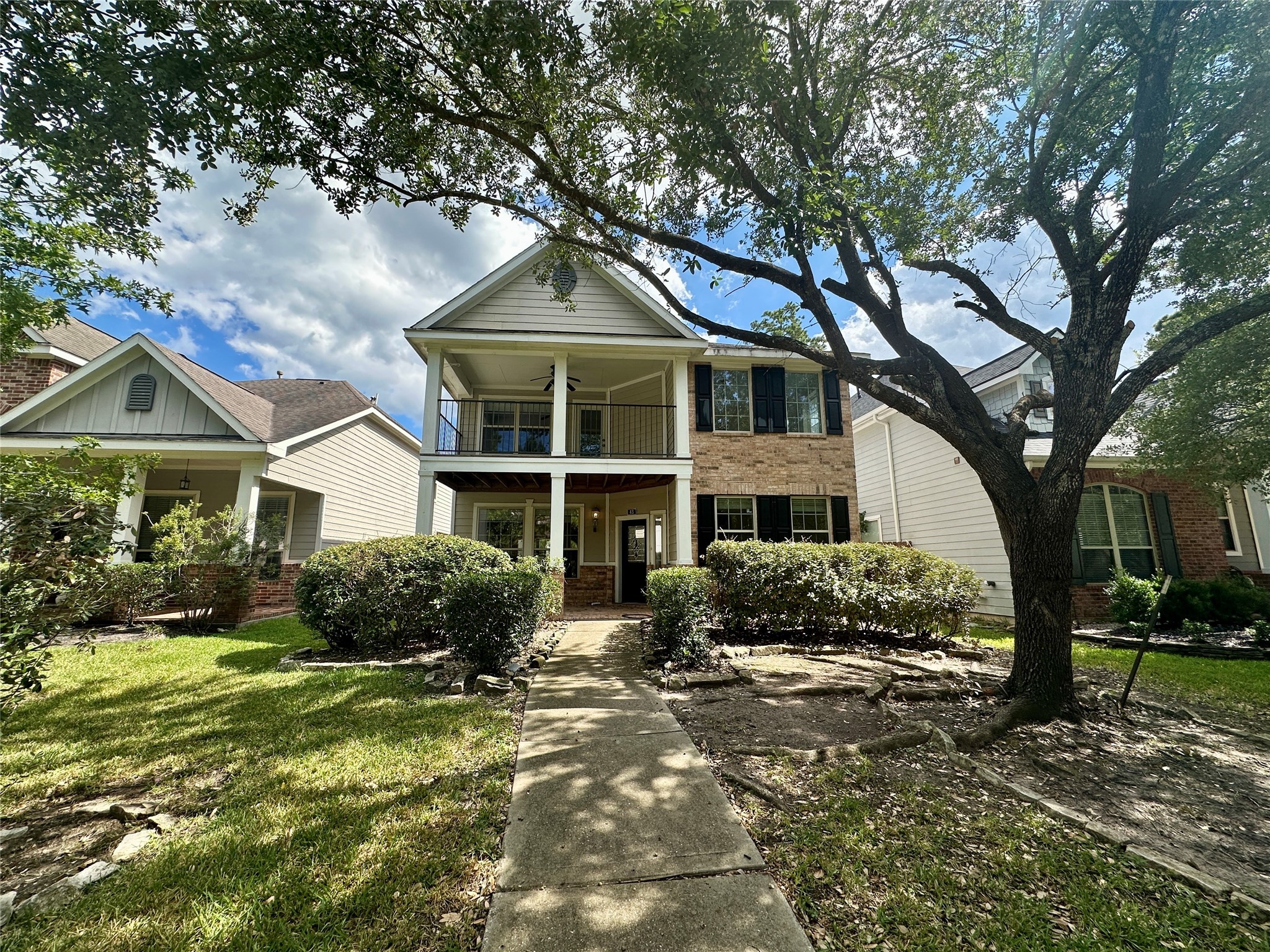 43 Panterra Way Spring, TX 77382 - Photo 2 of 17 a front view of a house with a yard
