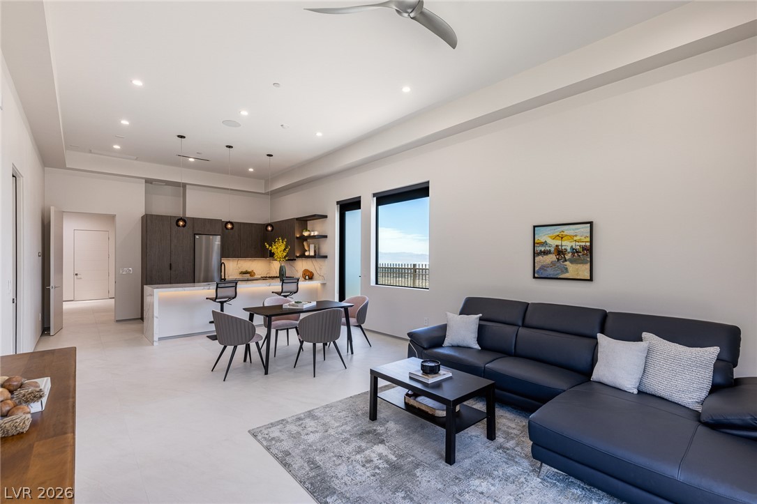 563 Grand Rim Drive Henderson, NV 89012 - Photo 34 of 70 An open-concept attached casita contemporary kitchen flows seamlessly into a spacious living area.
