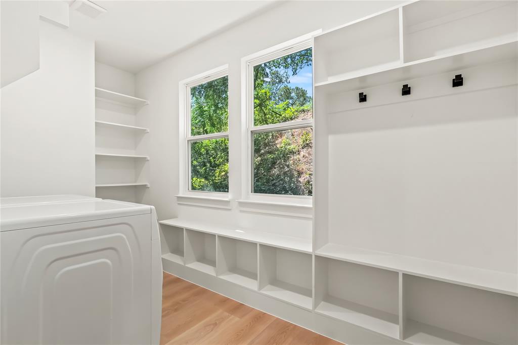 1312 Compton Street Dallas, TX 75203 - Photo 12 of 31 a view of walk in closet with empty racks