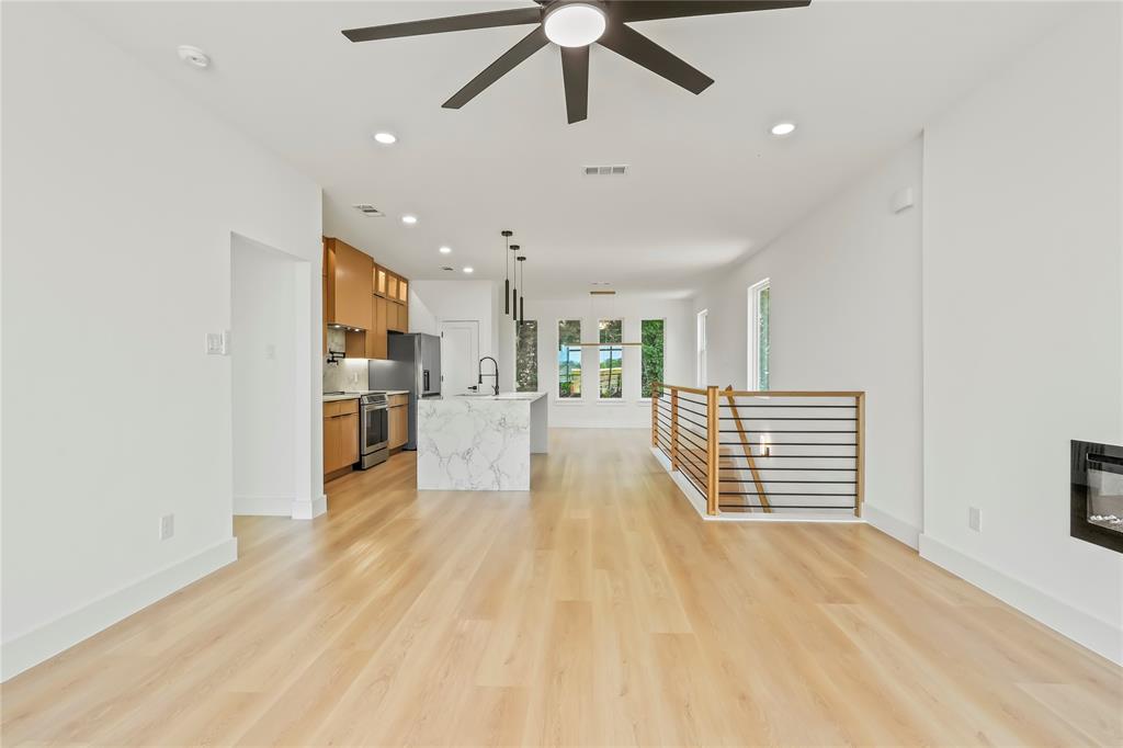 1312 Compton Street Dallas, TX 75203 - Photo 17 of 31 a view of a kitchen with wooden floor