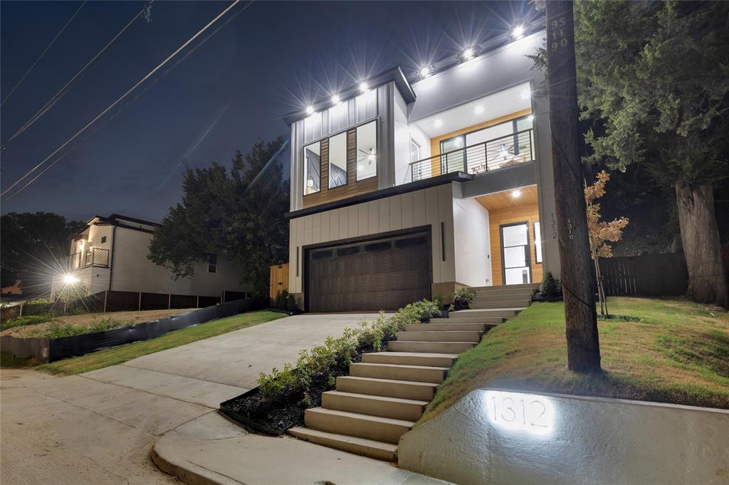 1312 Compton Street Dallas, TX 75203 - Photo 4 of 31 a front view of a house with a yard