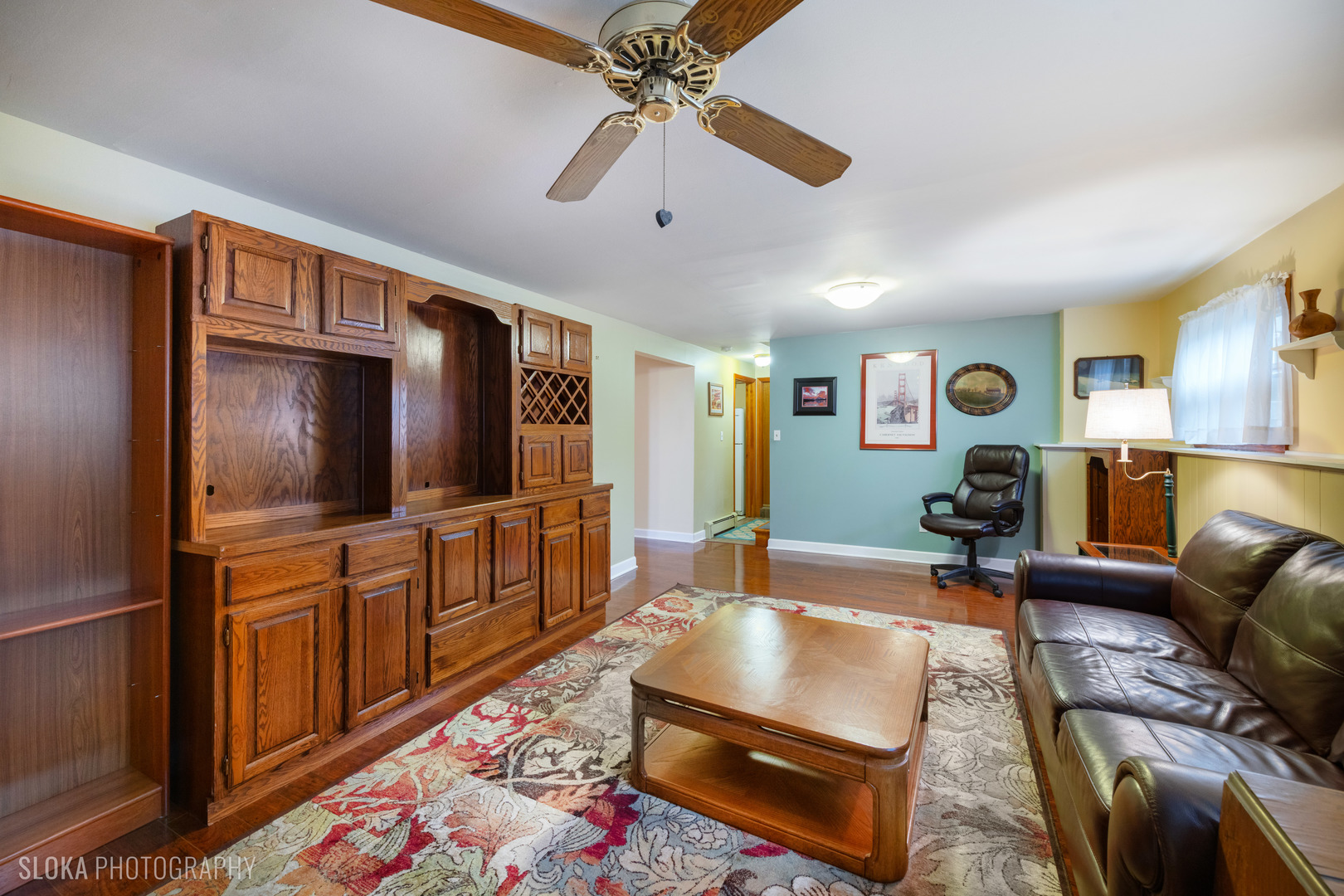 101 Clay Street Algonquin, IL 60102 - Photo 12 of 23 a living room with furniture and a flat screen tv