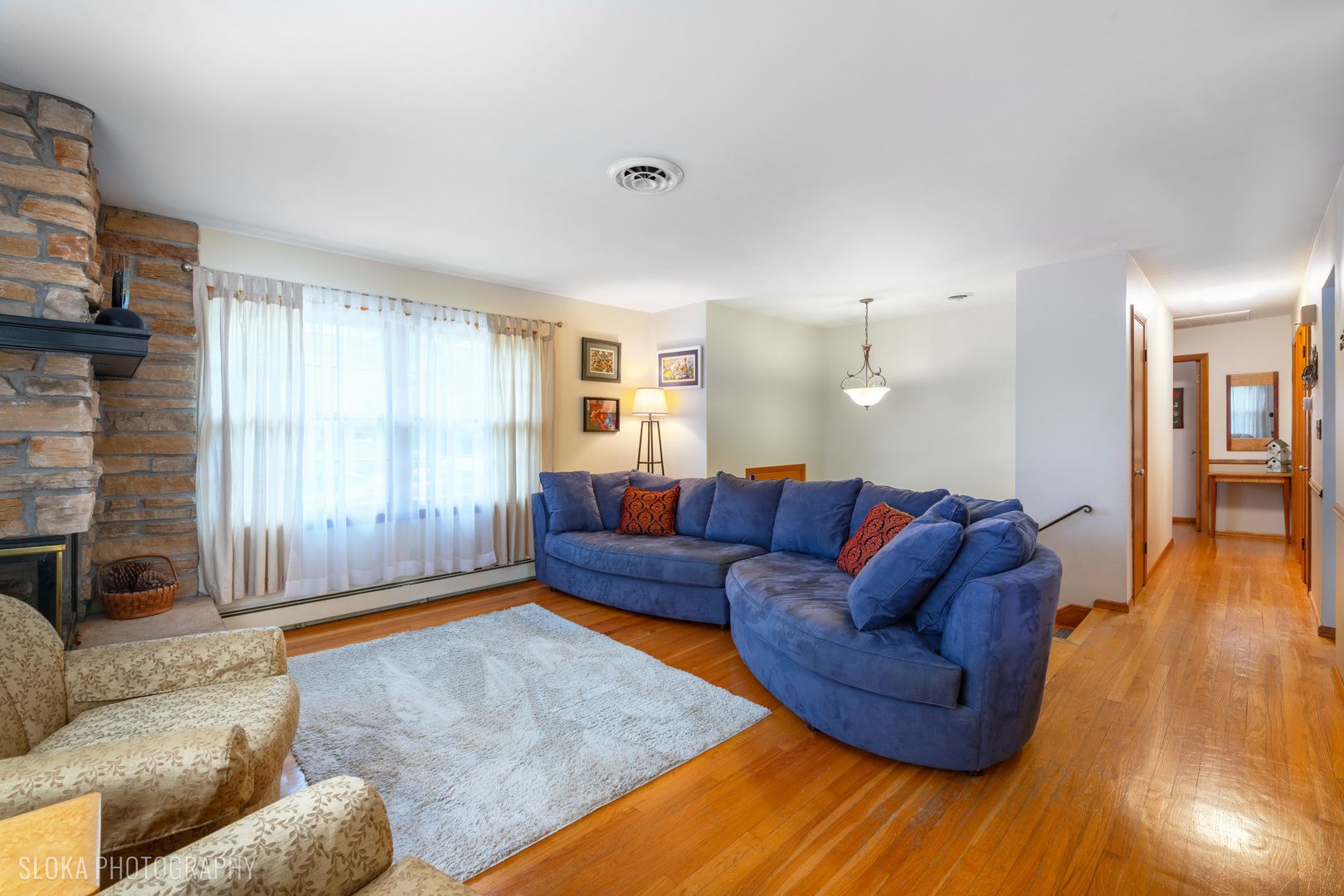 101 Clay Street Algonquin, IL 60102 - Photo 5 of 23 a living room with furniture and a large window