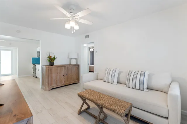 a living room with furniture and a couch