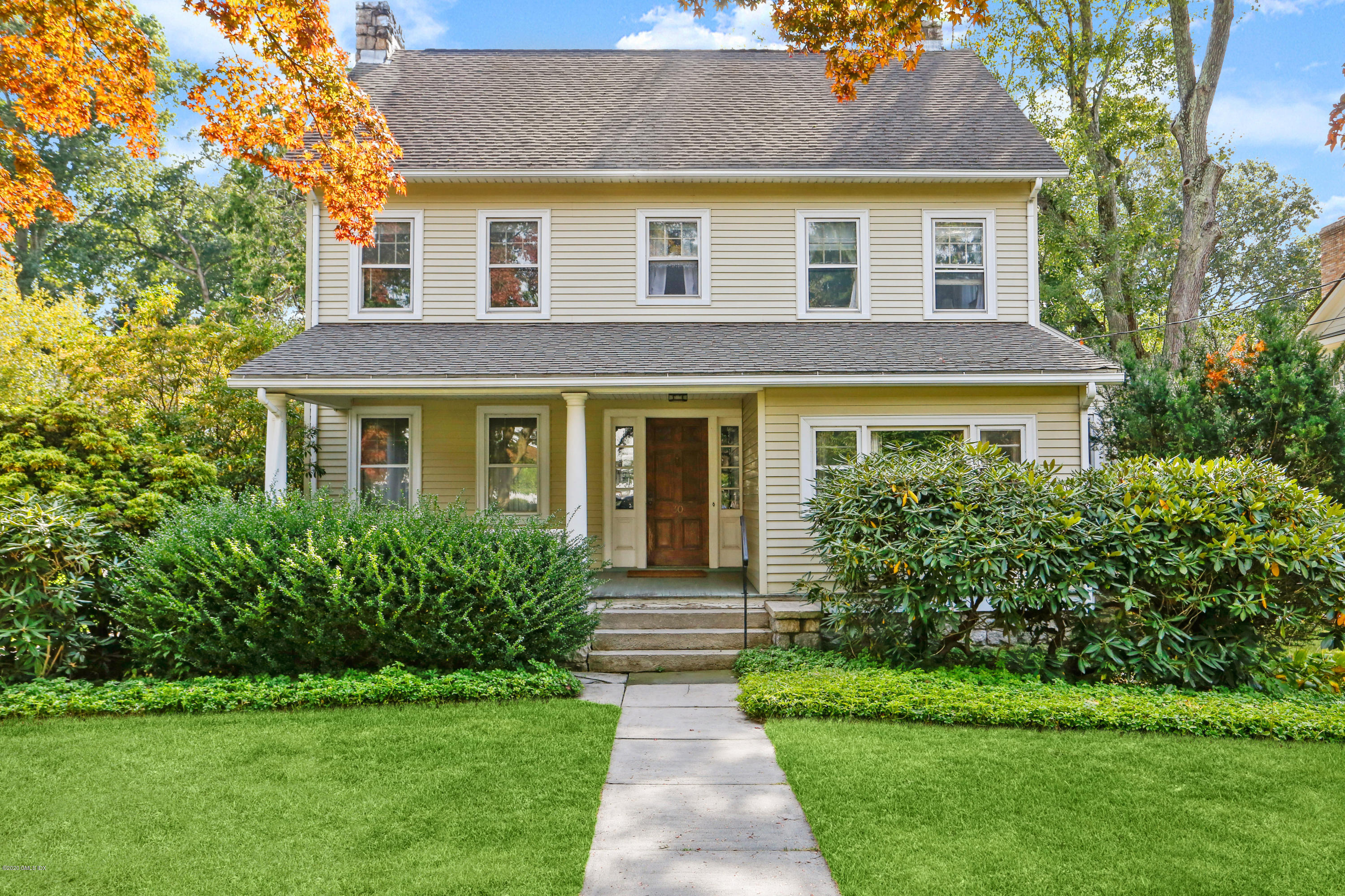 30 Hendrie Avenue Riverside, CT 06878 - Photo 1 of 31 a front view of a house with garden