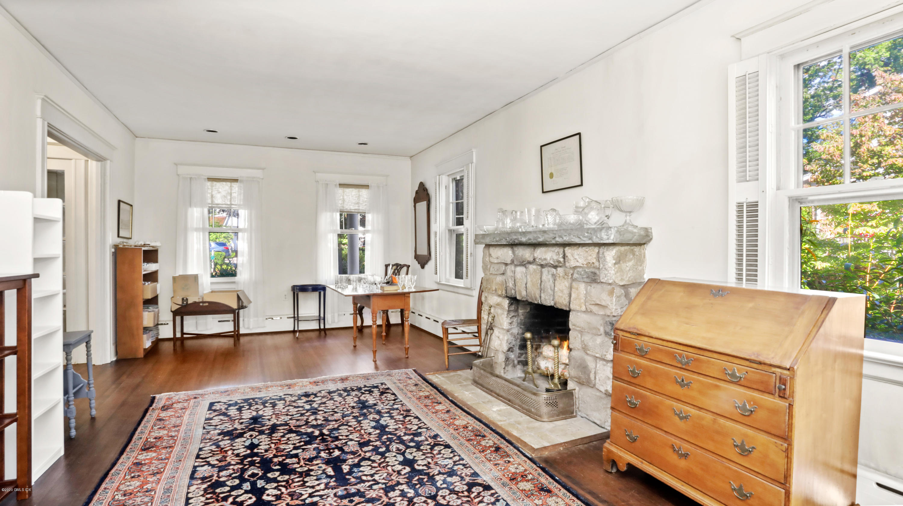 30 Hendrie Avenue Riverside, CT 06878 - Photo 5 of 31 a living room with furniture fireplace and window