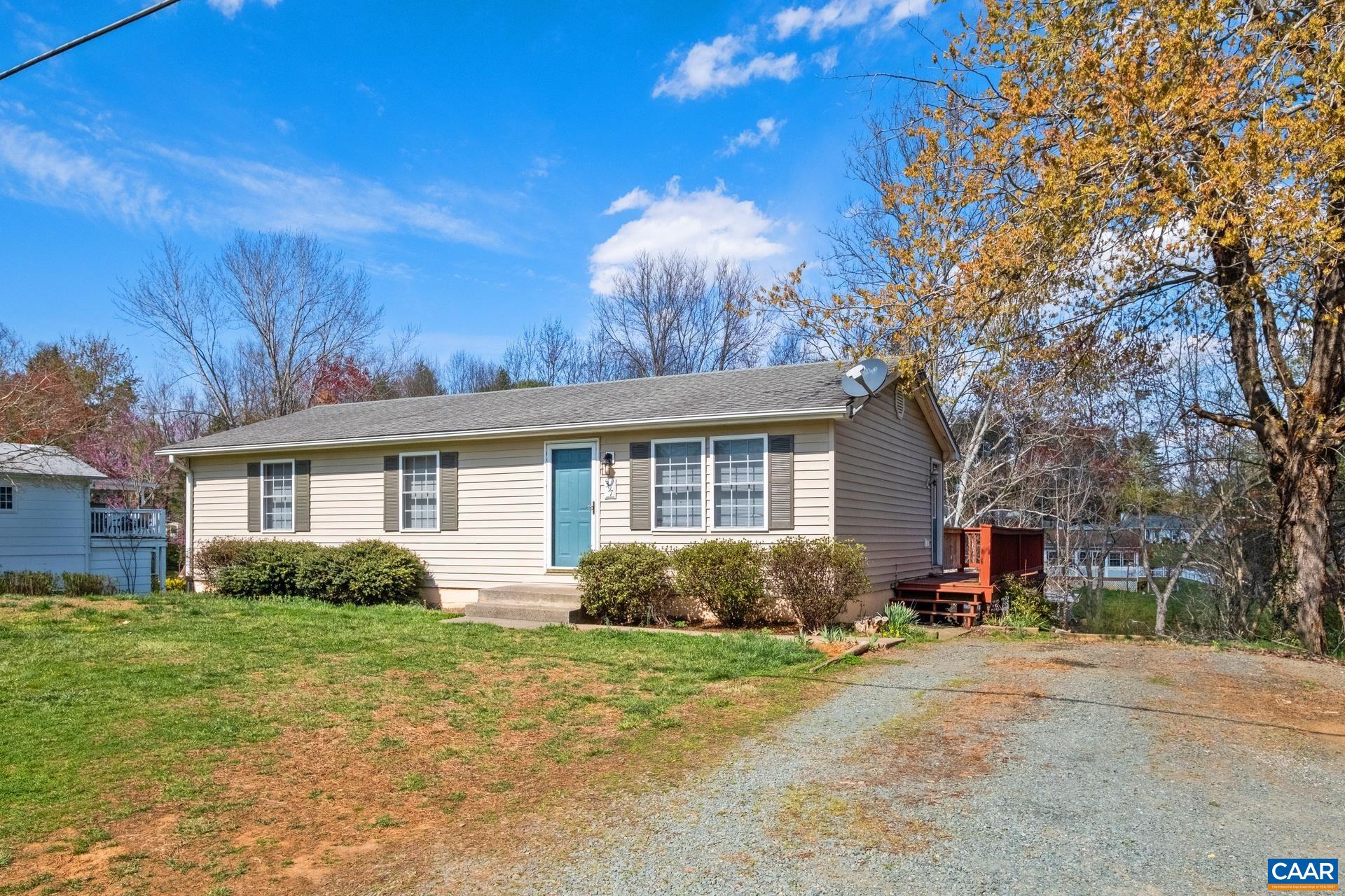 397 Carpenters Mill Road Ruckersville, VA 22968 - Photo 1 of 30 a front view of house with yard and trees around
