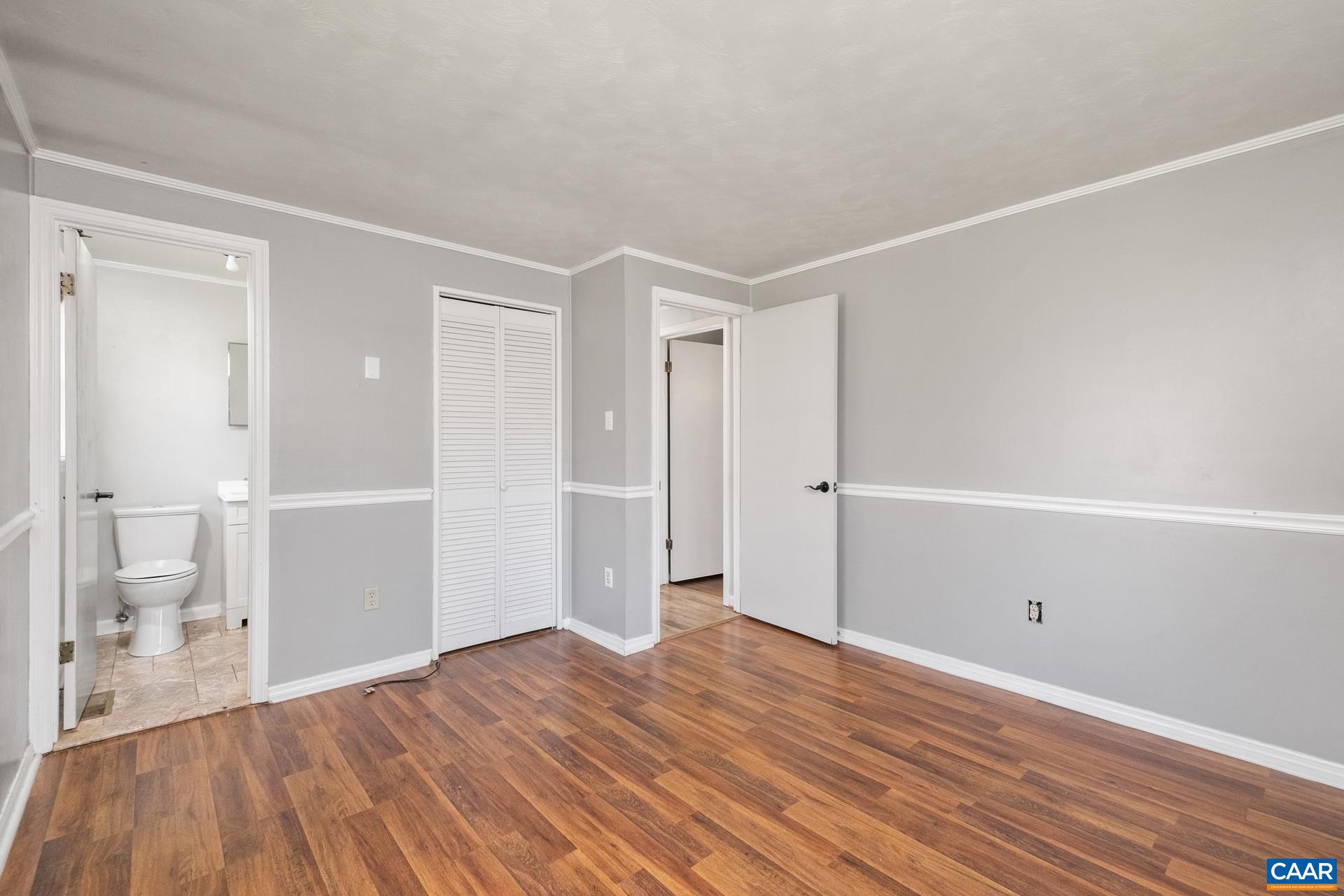 397 Carpenters Mill Road Ruckersville, VA 22968 - Photo 17 of 30 a view of empty room with wooden floor