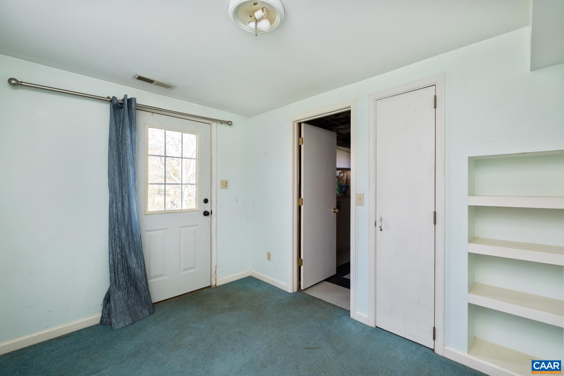397 Carpenters Mill Road Ruckersville, VA 22968 - Photo 23 of 30 a view of an empty room with a window