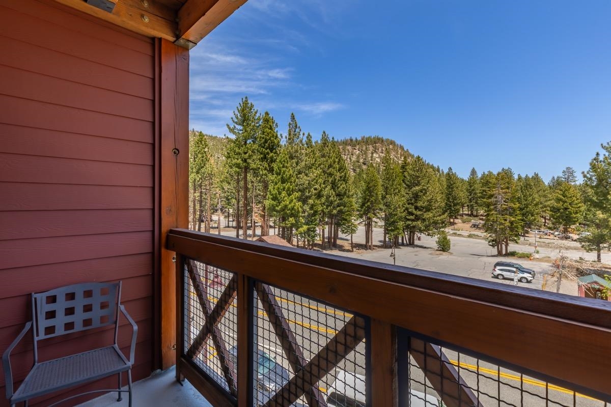 6201 Minaret Road, Unit 2215 Mammoth Lakes, CA 93546 - Photo 27 of 33 a view of a balcony with an outdoor space and seating
