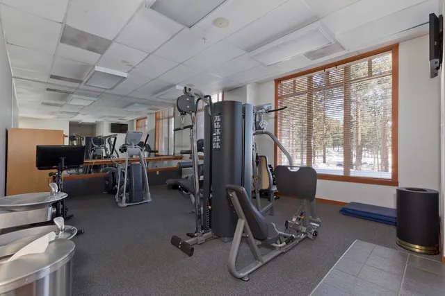 a view of a room with gym equipment