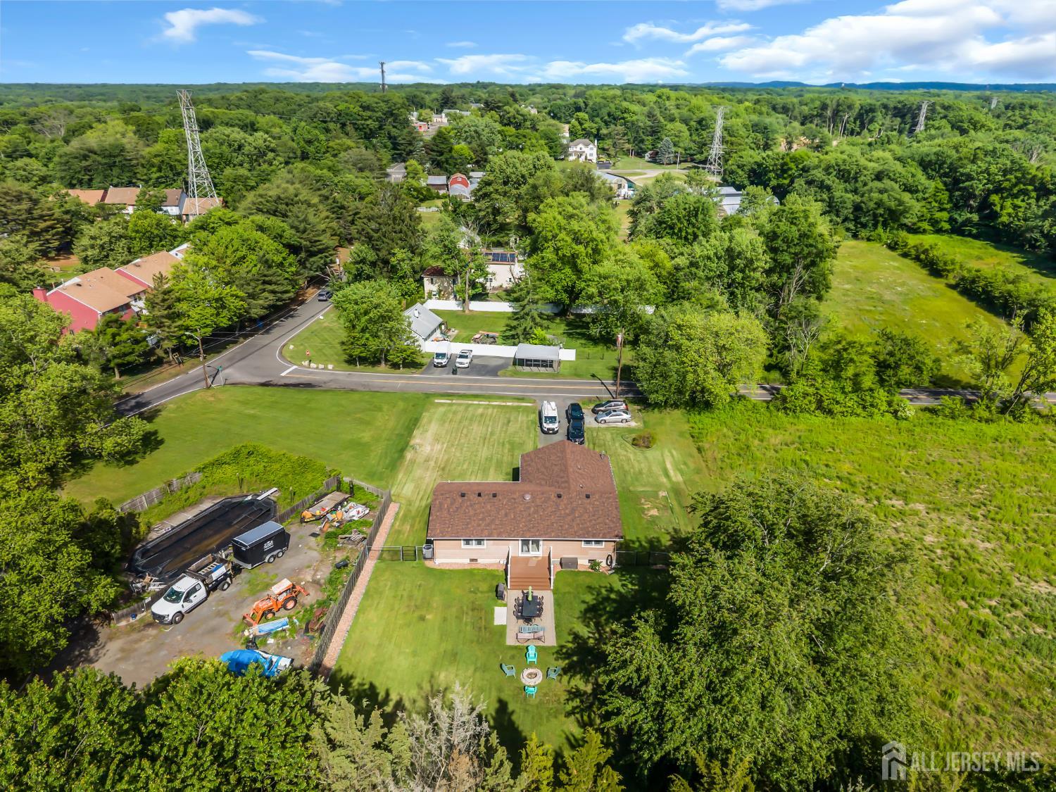 99 Schulmeister Road Old Bridge, NJ 08857 - Photo 39 of 49 an aerial view of a house with a yard