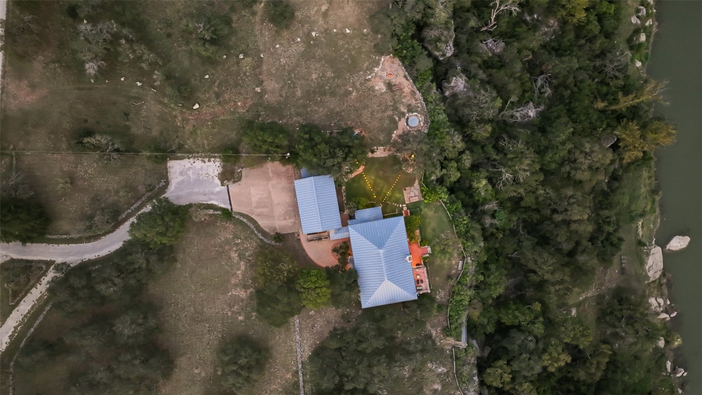 5229-5012 Hupedo Ranch Road Spicewood, TX 78669 - Photo 23 of 40 an aerial view of house with outdoor space
