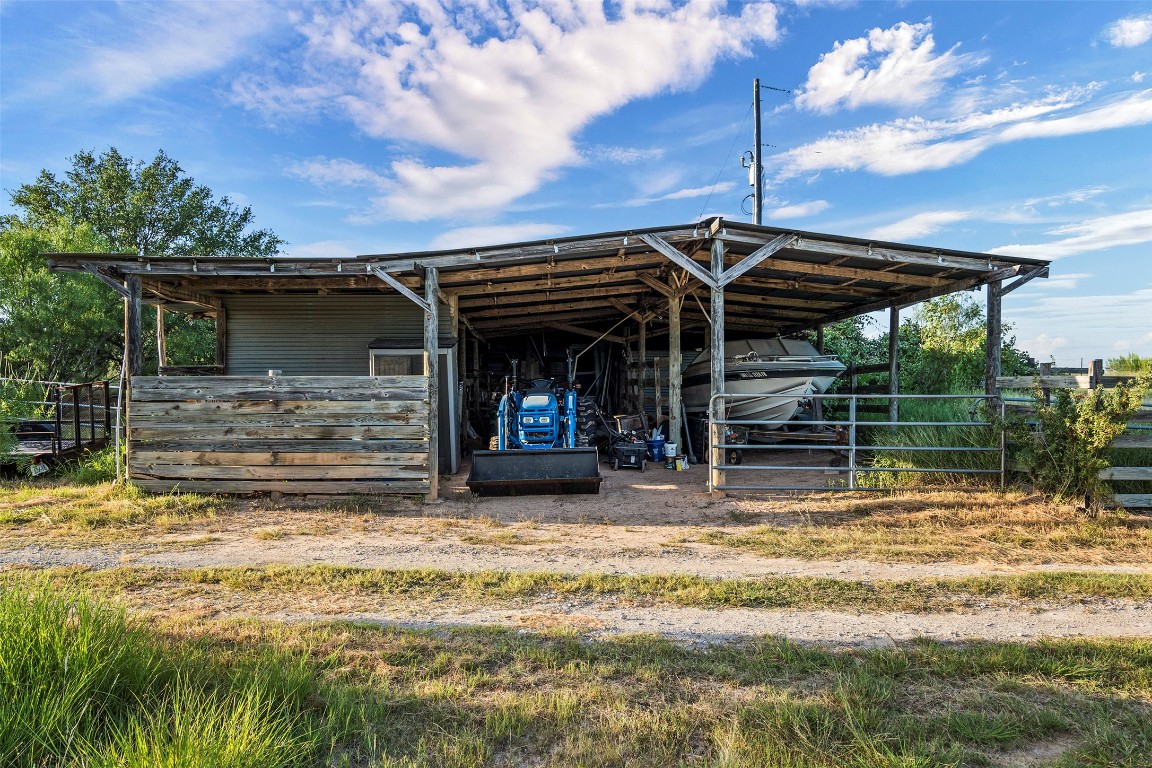 5229-5012 Hupedo Ranch Road Spicewood, TX 78669 - Photo 40 of 40 a view of a house with a swimming pool