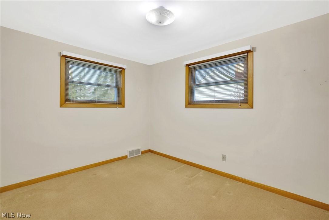 4820 15th Street Northwest Canton, OH 44708 - Photo 16 of 28 Second bedroom with carpet and windows