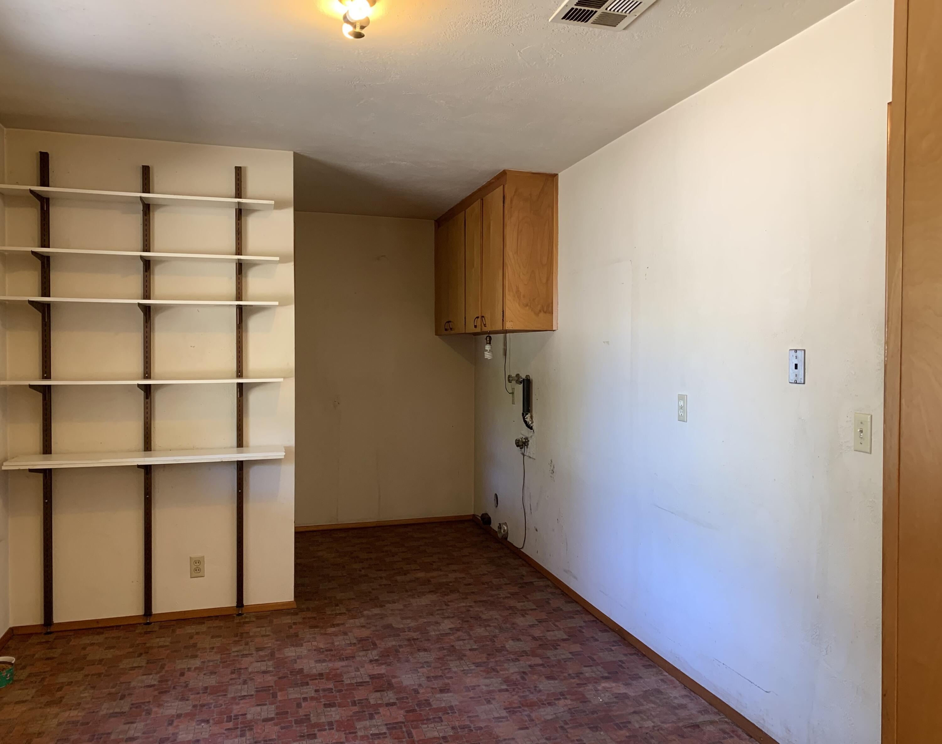 211 Princess Way Central Point, OR 97502 - Photo 19 of 45 laundry and storage area off of kitchen