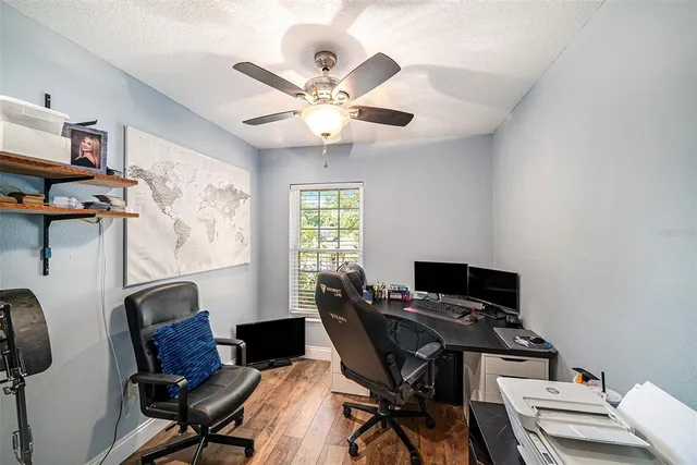 a workspace with furniture and a window