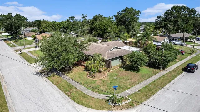 a view of a swimming pool with sitting area