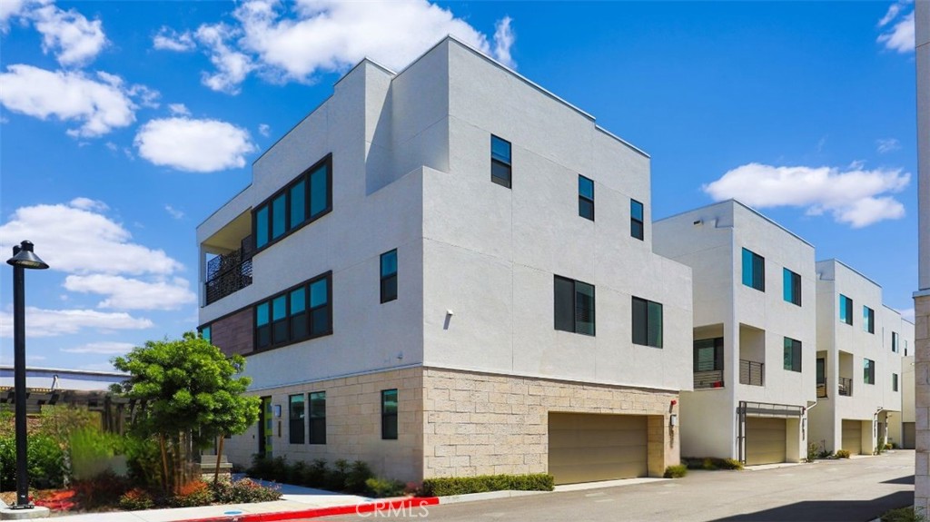 2180 Pearl Walk Gardena, CA 90249 - Photo 23 of 23 a view of a white building among the street