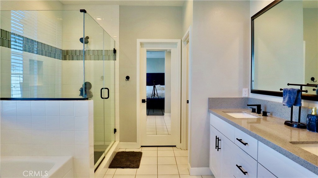 2180 Pearl Walk Gardena, CA 90249 - Photo 6 of 23 a bathroom with a sink and a mirror