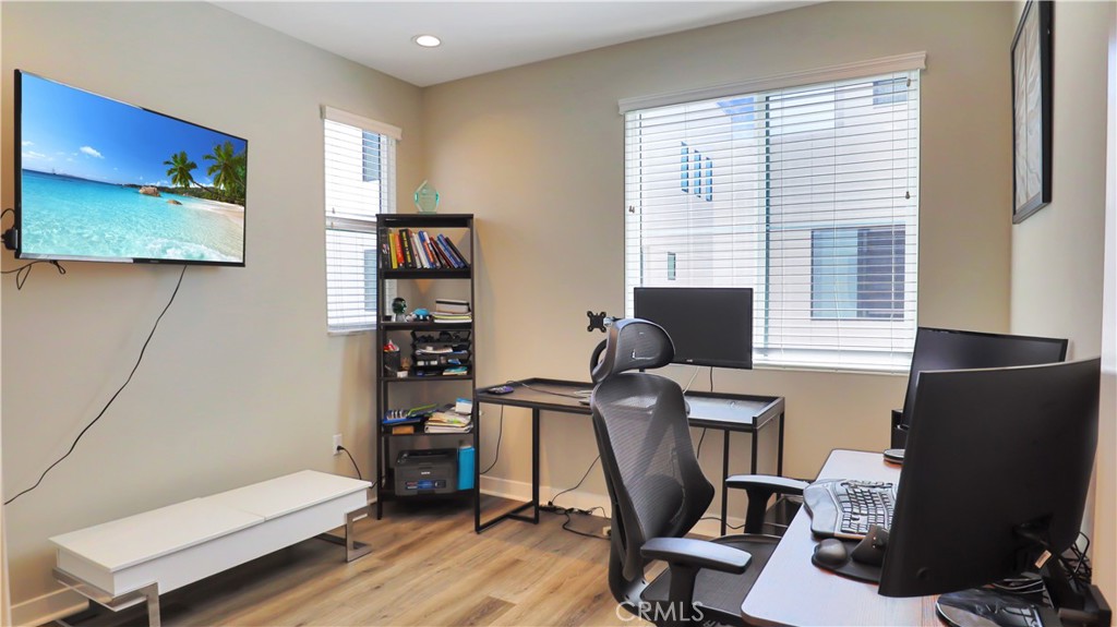 2180 Pearl Walk Gardena, CA 90249 - Photo 10 of 23 a view of a workspace with furniture and a window