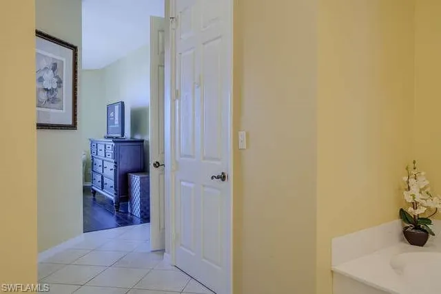 a view of a hallway and interior of the house