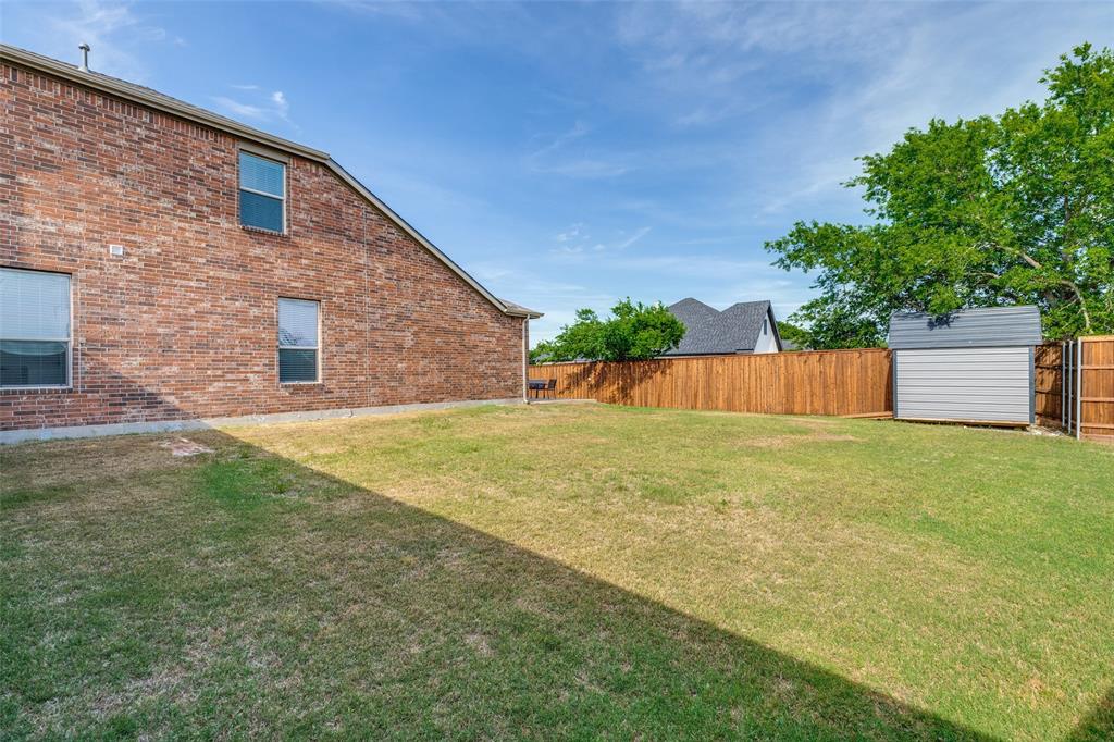 1800 Rodeo Drive Anna, TX 75409 - Photo 32 of 33 Huge side yard for any play, hobbies or sports.