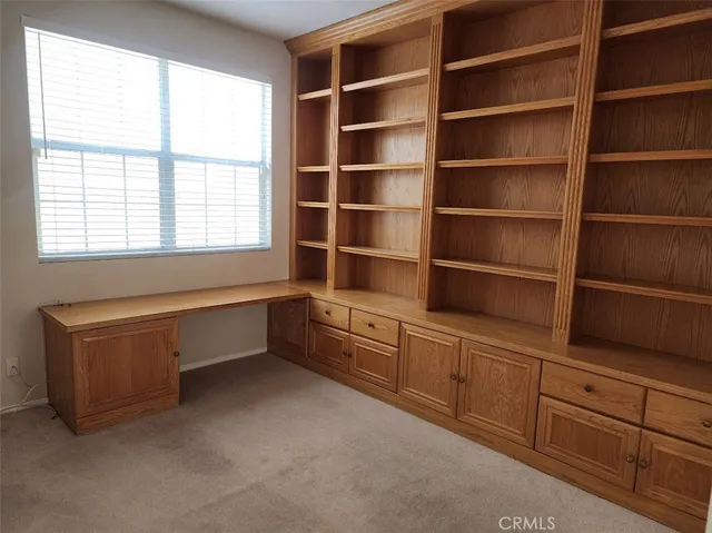 a room with cabinets and window