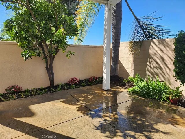 a view of a room with painting on the wall