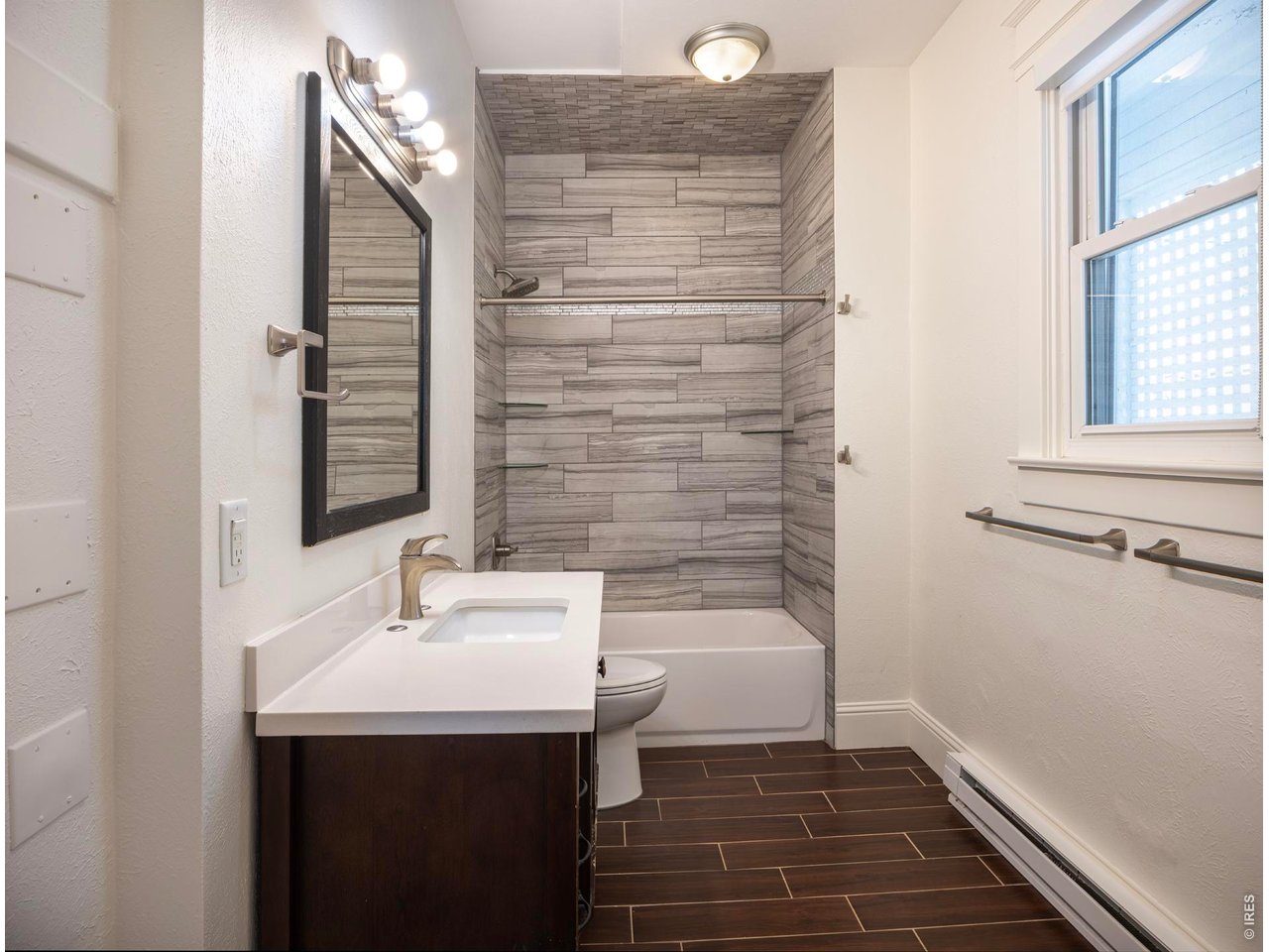 613 Pine Street Boulder, CO 80302 - Photo 17 of 23 a bathroom with a sink and a mirror