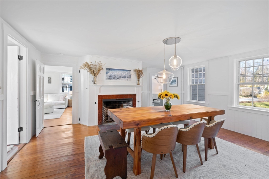 118 Main Street Sandwich, MA 02563 - Photo 12 of 41 a dining room with furniture and wooden floor