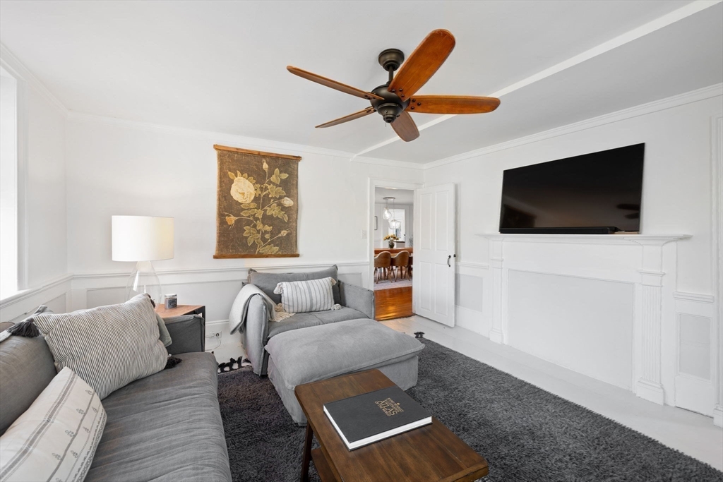 118 Main Street Sandwich, MA 02563 - Photo 20 of 41 a living room with furniture and a flat screen tv