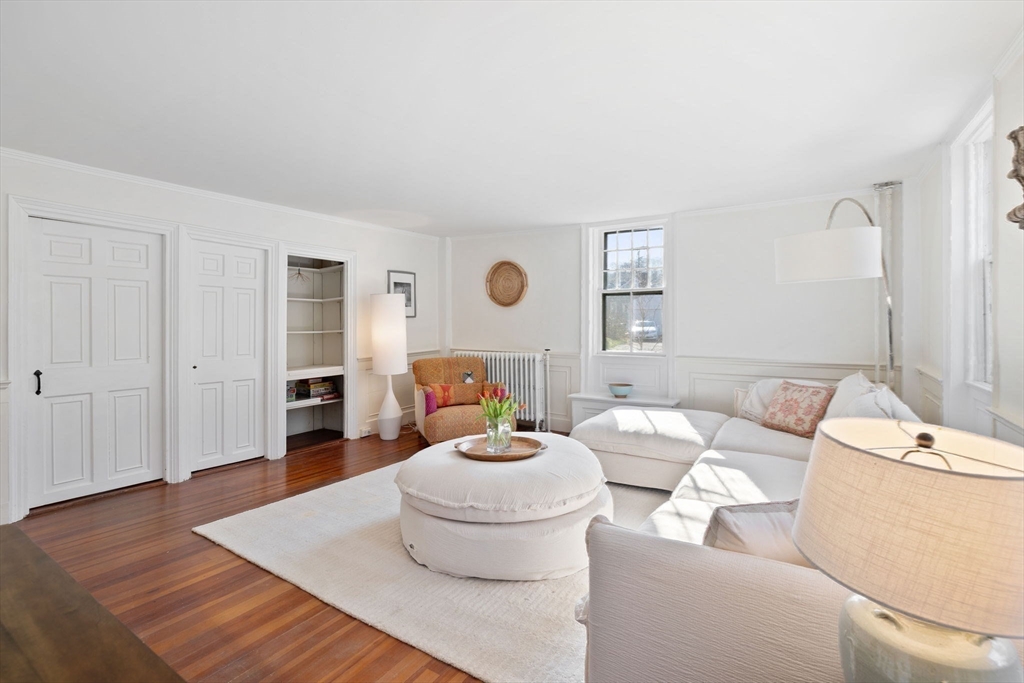 118 Main Street Sandwich, MA 02563 - Photo 22 of 41 a living room with furniture and a wooden floor