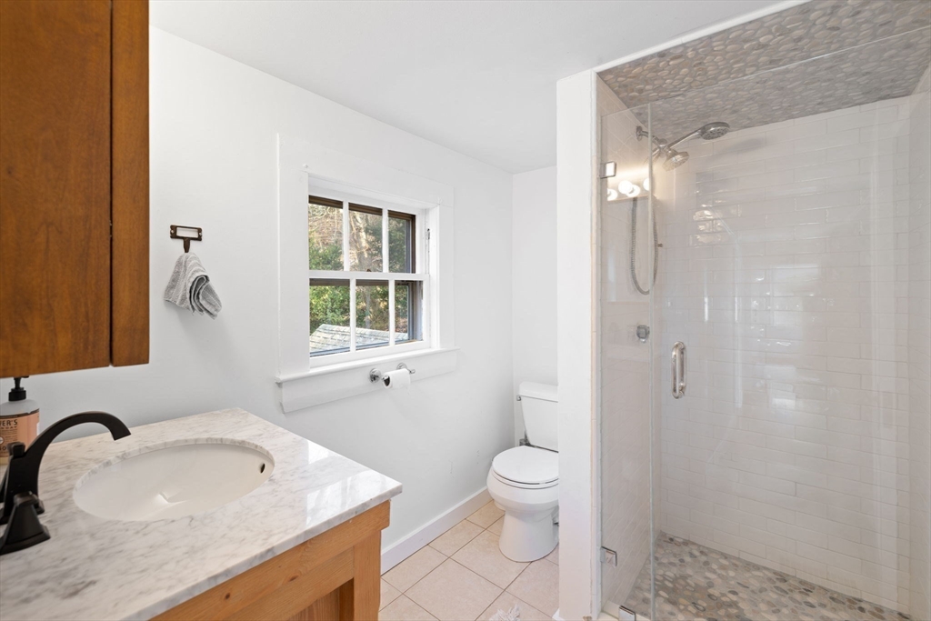 118 Main Street Sandwich, MA 02563 - Photo 28 of 41 a bathroom with a sink toilet and shower