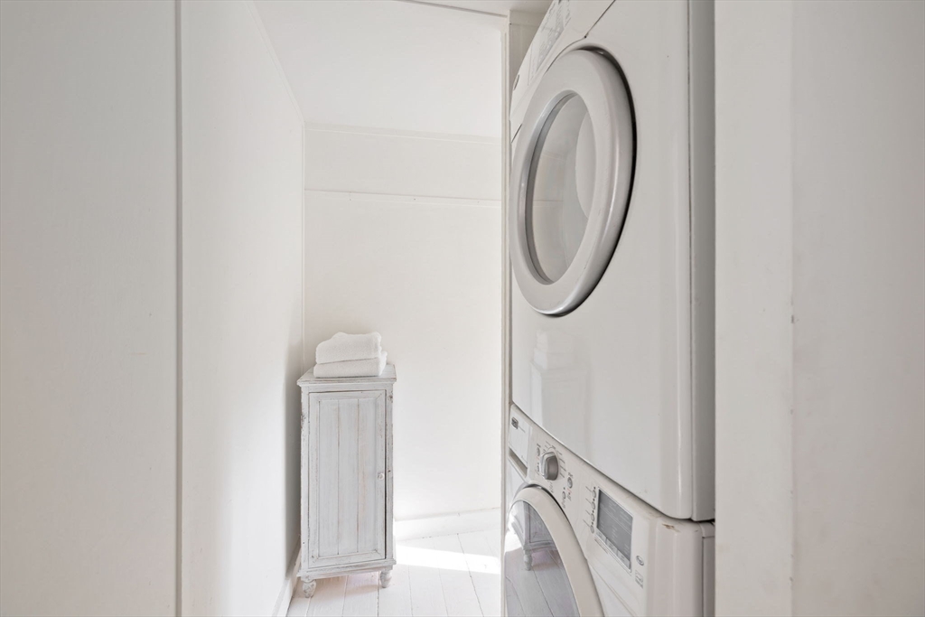 118 Main Street Sandwich, MA 02563 - Photo 31 of 41 a close view of utility room with washer and dryer
