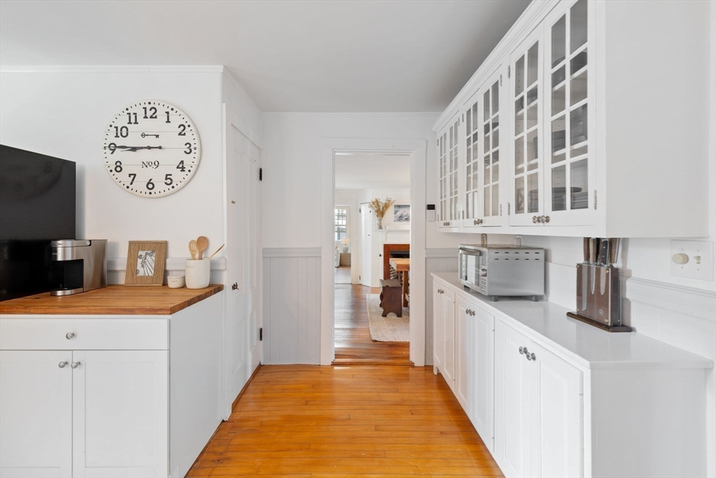 118 Main Street Sandwich, MA 02563 - Photo 9 of 41 a kitchen with stainless steel appliances granite countertop a sink and cabinets