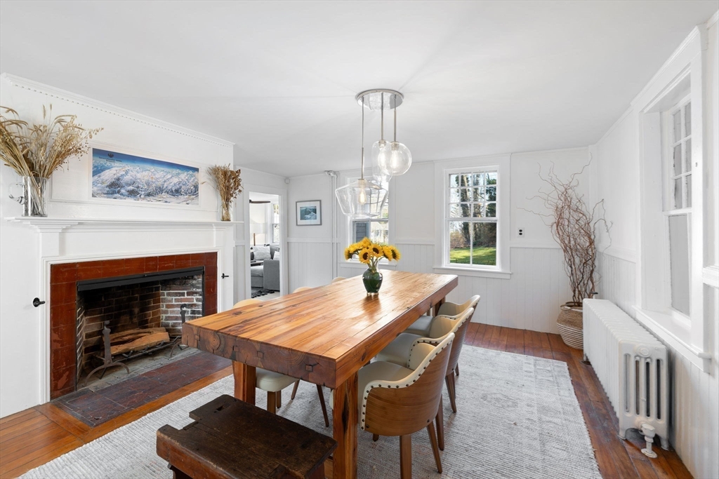 118 Main Street Sandwich, MA 02563 - Photo 10 of 41 a view of a livingroom with furniture and a fireplace