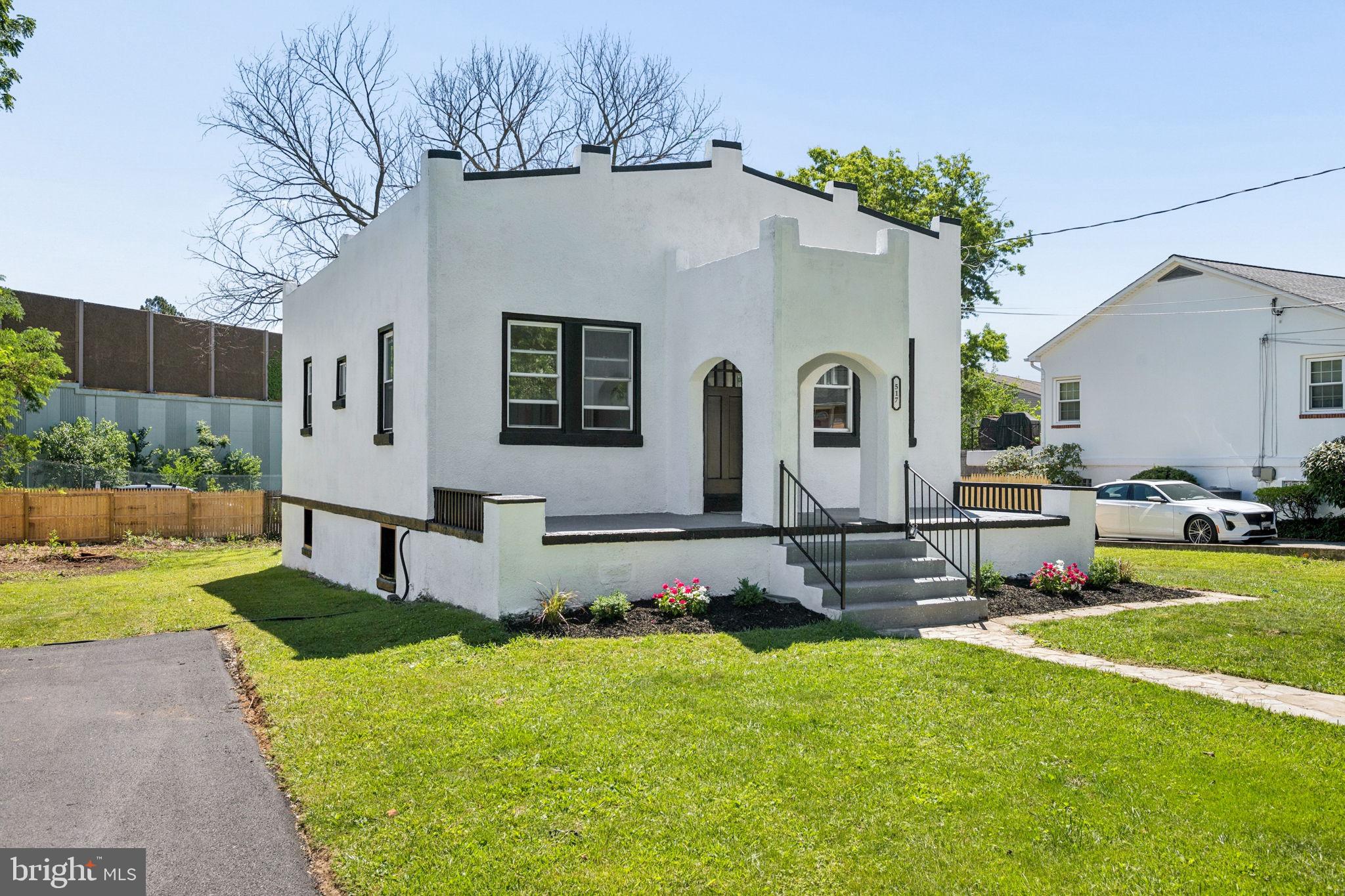 517 Valcour Road Baltimore, MD 21228 - Photo 8 of 47 a front view of house with yard