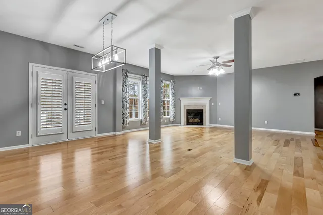 a white bath tub sitting next to a window